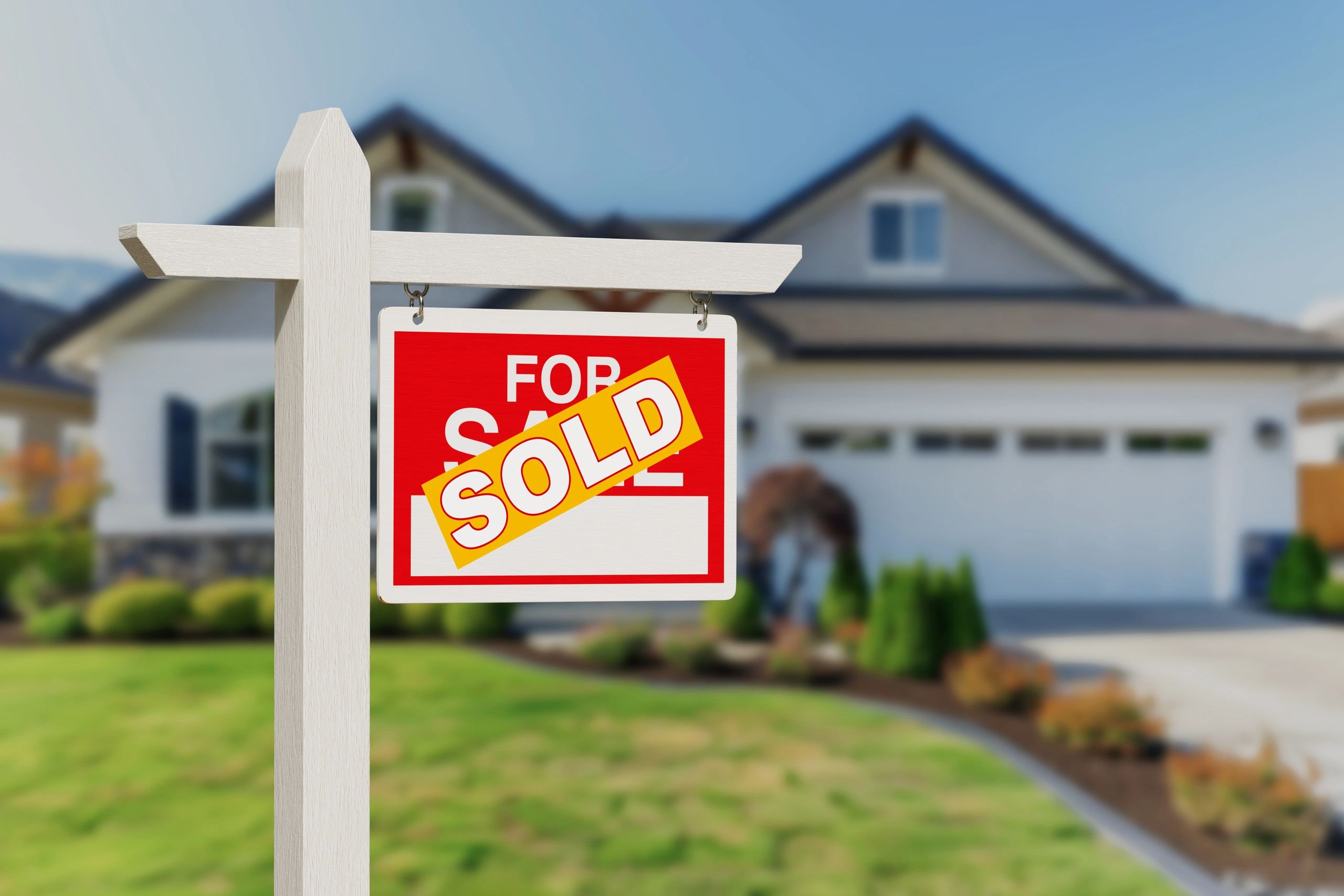 Real Estate Wooden Sign with Yellow Sold Sticker